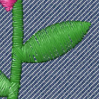 A leaf on denim